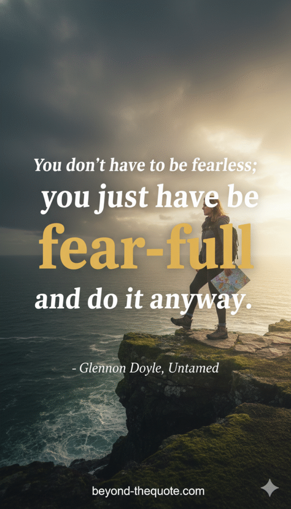 A person stands on a mountain cliff overlooking a fiery sunset with clouds, while a shadowy, red-eyed monster stands behind them, illustrating the quote about acting despite fear.