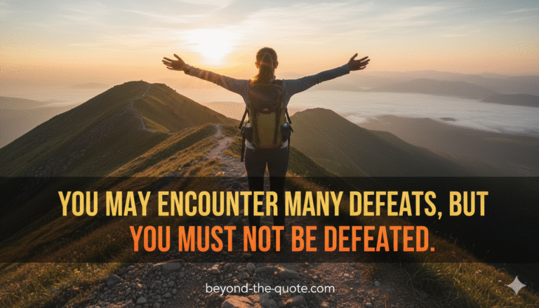 A woman stands triumphantly on a mountain peak at sunrise, with arms outstretched, overlooking a vast landscape, with Maya Angelou's quote.